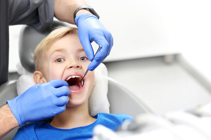 boy getting dental checkup